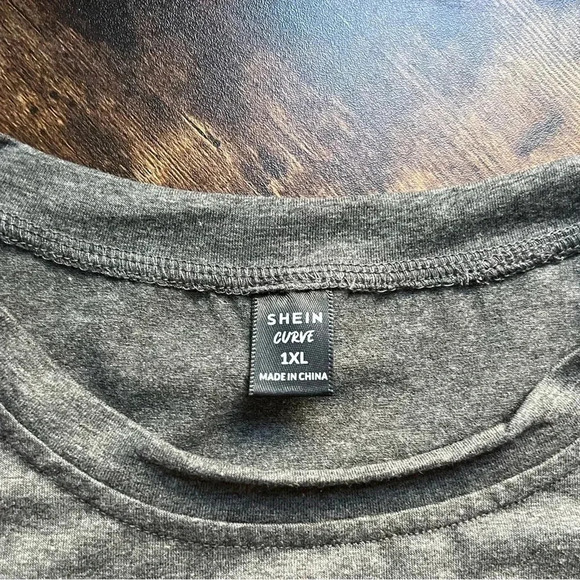 BUNDLE: (1) Bagatelle pleather shorts, (1) Shein tee, (1) wood heart earrings - Picture 9 of 16